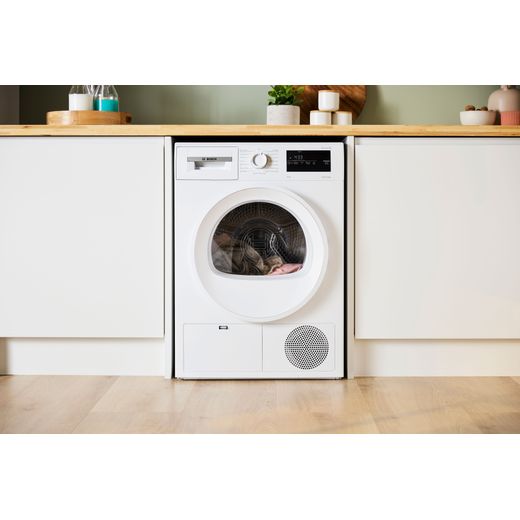 Bosch Series 4 WTH85225GB 8Kg Heat Pump Tumble Dryer - White - Tumble dryer in kitchen shot