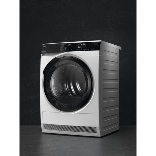 AEG 8000 AbsoluteCare® TR848A4B2 8Kg Heat Pump Tumble Dryer - Black - Tumble dryer in dark room