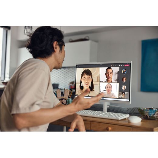 HP 22 -dg0007na 21.45" All in One - Intel Celeron, 128GB UFS - White - Man on video call with desktop