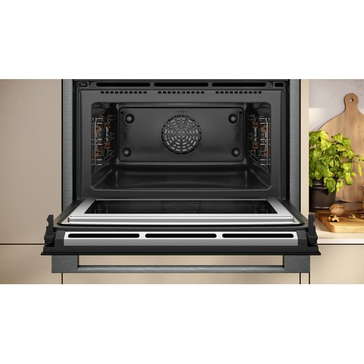 NEFF N90 Compact Electric Single Oven - Graphite - Oven with door open showing inside cavity shot