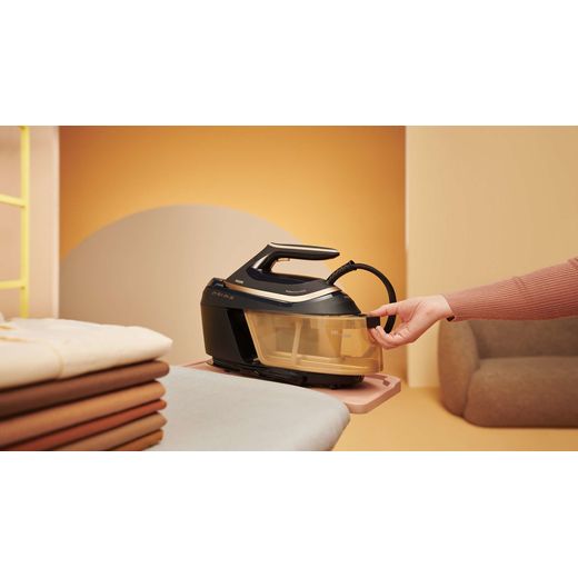 Philips PerfectCare 6000 Series Pressurised Steam Generator Iron - Gold / Black - Iron in use