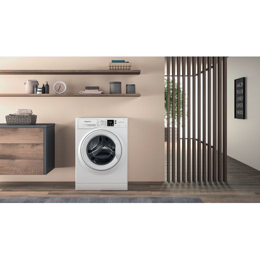 Hotpoint Anti-Stain NSWM 846 W UK 8kg Washing Machine with 1400 rpm - White - Washing machine in utility room shot
