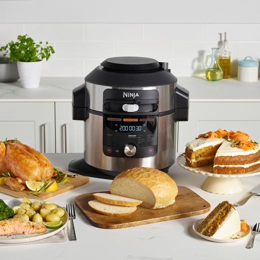 Ninja Foodi Max 15-in-1 SmartLid 7.5 Litre Multi Cooker - Stainless Steel / Black - Modern kitchen with Multi Cooker on kitchen island surrounded by different dishes