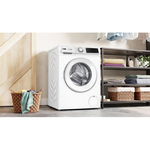 Bosch Series 6 WGJ25400GB 10kg Washing Machine with 1351 rpm - White - Washing machine in utility room shot