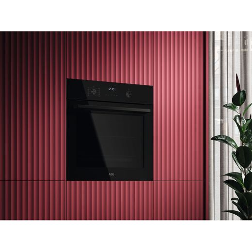 AEG SenseCook Aqua Built In Electric Single Oven - Black - Oven in kitchen shot