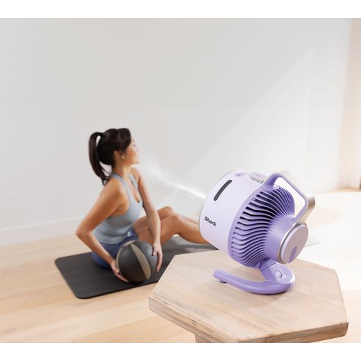 Shark FlexBreeze HydroGo Misting Fan - FA050UKLV - Lavender - Woman working out with fan