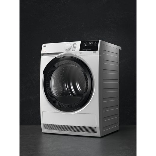 AEG 7000 Series TR718A4B 8Kg Heat Pump Tumble Dryer - White - Tumble dryer in room shot