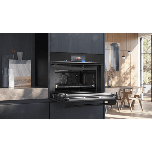 Siemens IQ-700 Built In Electric Double Oven - Black - Oven door open in kitchen