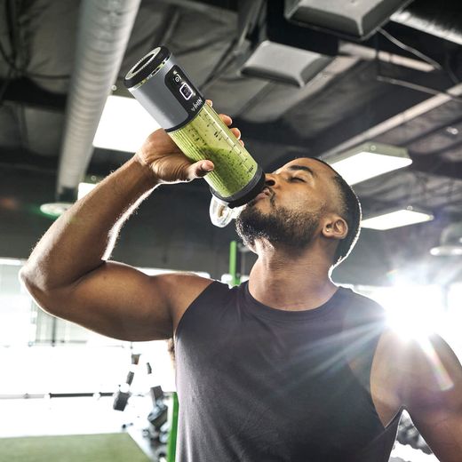 Ninja Blast BC151UKBK Portable Blender - Black - Man drinking from blender in gym
