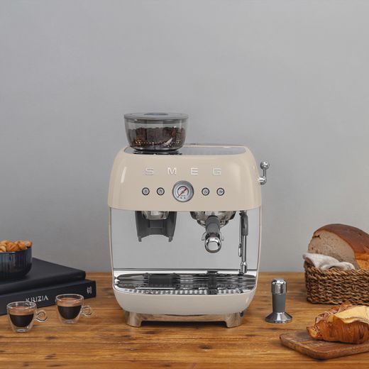 Smeg EGF03CRUK Coffee Machines Almond Cream - Coffee machine on table with coffee and food
