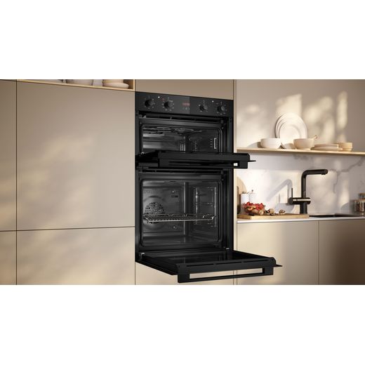 NEFF N30 Built In Electric Double Oven - Black - Oven doors open in kitchen