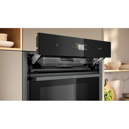NEFF N90 Slide & Hide® Built In Electric Single Oven - Graphite  - Panel lifted upwards shot