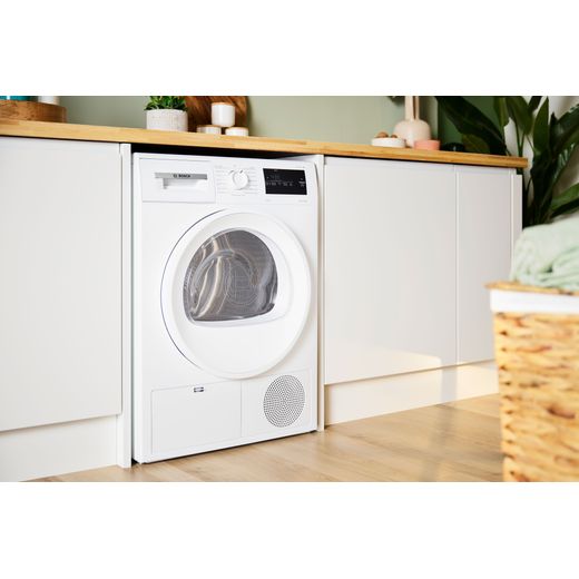 Bosch Series 4 WTH85225GB 8Kg Heat Pump Tumble Dryer - White - Tumble dryer in kitchen shot