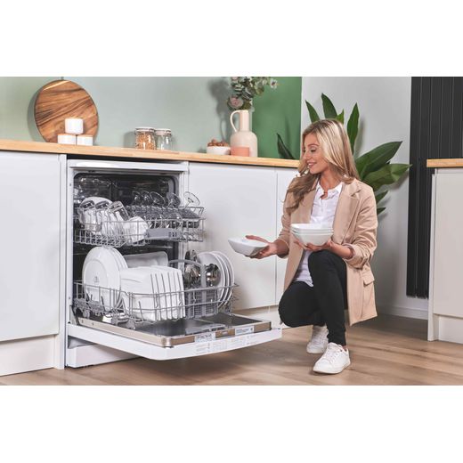 Bosch Series 2 Standard Dishwasher - White - Woman filling dishwasher