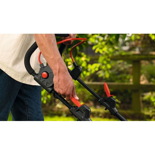 Bosch Rotak 18V2-43 Lawn Mower, Including Battery - Person using control shot