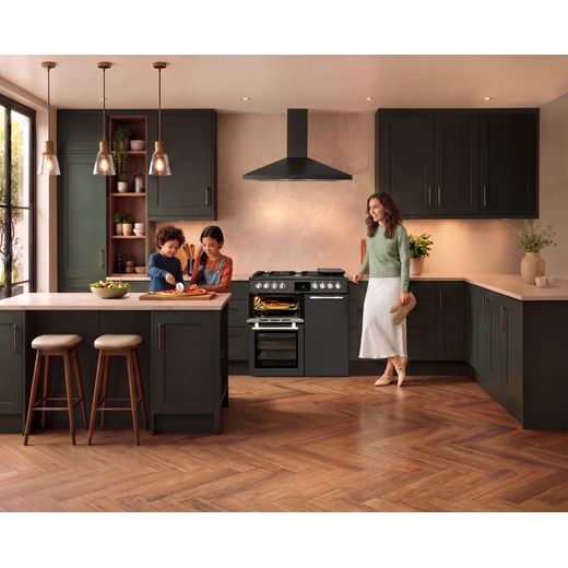 Hotpoint RH90FA20A 90cm wide Dual Fuel Range Cooker with Gas Hob - Anthracite - family cooking in kitchen shot