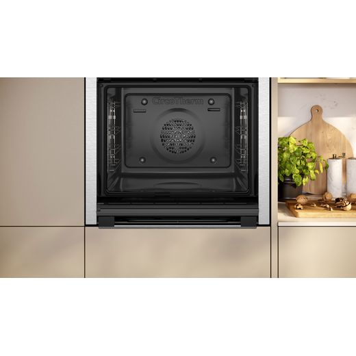 B6ACH7AN7B_SS - Front with oven in kitchen shot