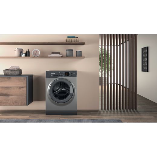 Hotpoint Anti-Stain NSWM 846 GG UK 8kg Washing Machine with 1400 rpm - Graphite - Washing machine in utility room shot